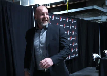 Apr 13, 2025; Portland, Oregon, USA;  Portland Trail Blazers general manager Joe Cronin departs the presser before the Trail Blazers play Los Angeles Lakers at Moda Center. Mandatory Credit: Jaime Valdez-Imagn Images