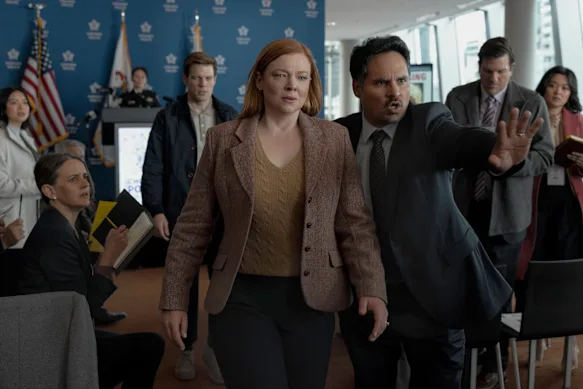 Sarah Snook as Marissa, Michael Pena as Detective Alcaras, and Jake Lacy as Peter (background).