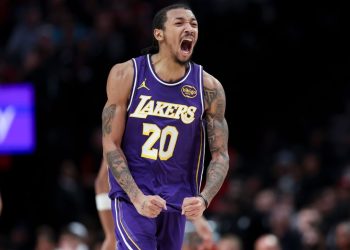 Short-handed Lakers win at Portland with help of Nick Smith Jr.