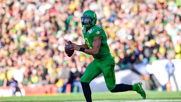 oregon ducks marcus mariota quarterback heisman trophy dan lanning nfl college football dante moore justin herbert gabriel 