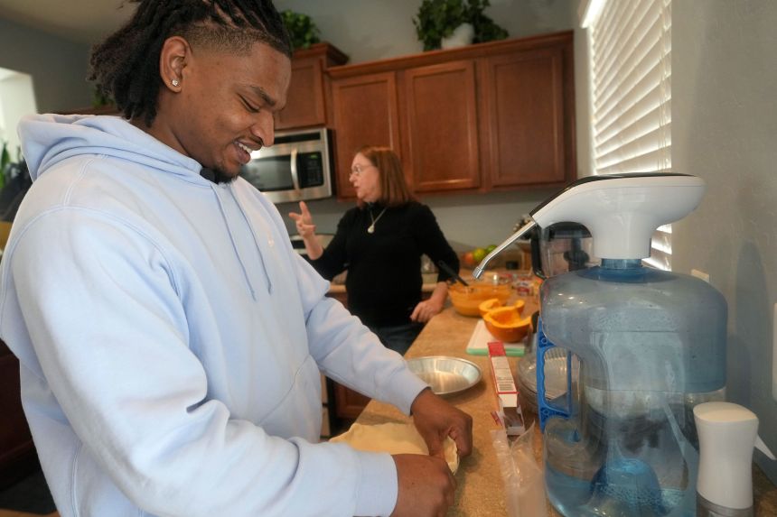 Hinton has somehow gotten out of cooking each Thanksgiving, Dench joked, though he's lent a helping hand to her in the past.