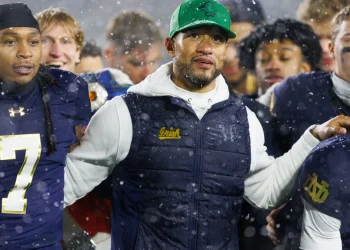 Notre Dame football coach Marcus Freeman blocks out the noise of NFL rumors