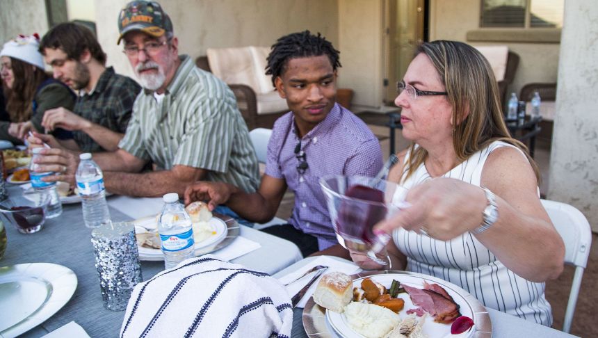 Hinton was just 17 when he spent his first Thanksgiving with Dench and her family.