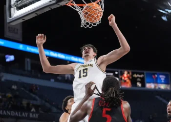 Wolverines rout Aztecs in Players Era Festival opener