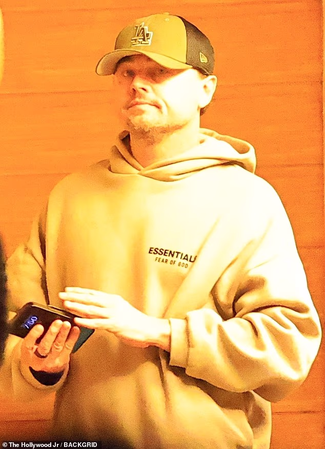 Leonardo DiCaprio made the rare move of stepping out in public without a face mask while leaving Nobu with his girlfriend Vittoria Ceretti and longtime pal Tobey Maguire