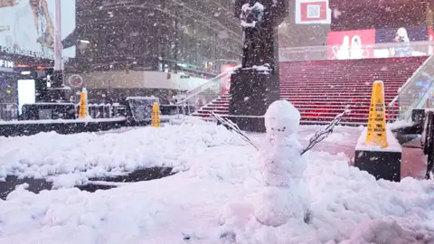 A snowman is seen in Times Square on Feb. 22, 2026, in New York, New York. (Photo by Noam Galai/Getty Images)