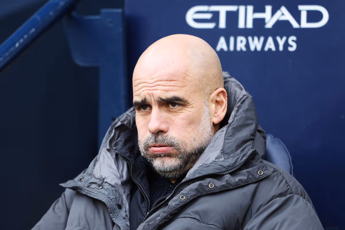 Pep Guardiola, Manager of Manchester City, looks on prior to the Emirates FA Cup Fourth Round match between Manchester City and Salford City at Etihad Stadium on February 14, 2026 in Manchester, England. 