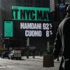 A billboard in New York City shows a Kalshi advertisement. It reads: Mamdani 92%, Cuomo 8%.