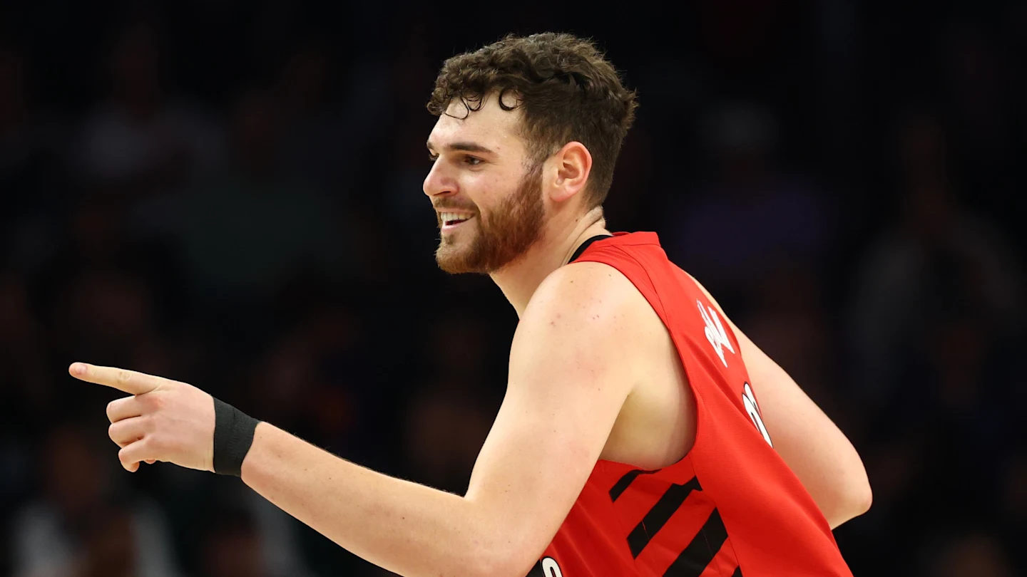 Feb 22, 2026; Phoenix, Arizona, USA; Portland Trail Blazers center Donovan Clingan (23) celebrates a shot against the Phoenix Suns in the first half at Mortgage Matchup Center. Mandatory Credit: Mark J. Rebilas-Imagn Images