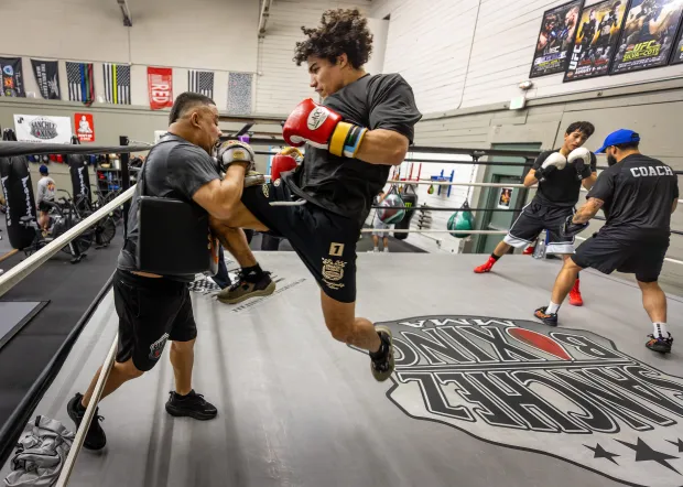 MMA fighter Imanol Rodriguez, who will be making his UFC debut on the Feb. 28 Mexico City, trains with Rosendo Sanchez Friday, Jan. 30, 2026 at the Sanchez Boxing MMA gym in Santa Rosa. (John Burgess/The Press Democrat)