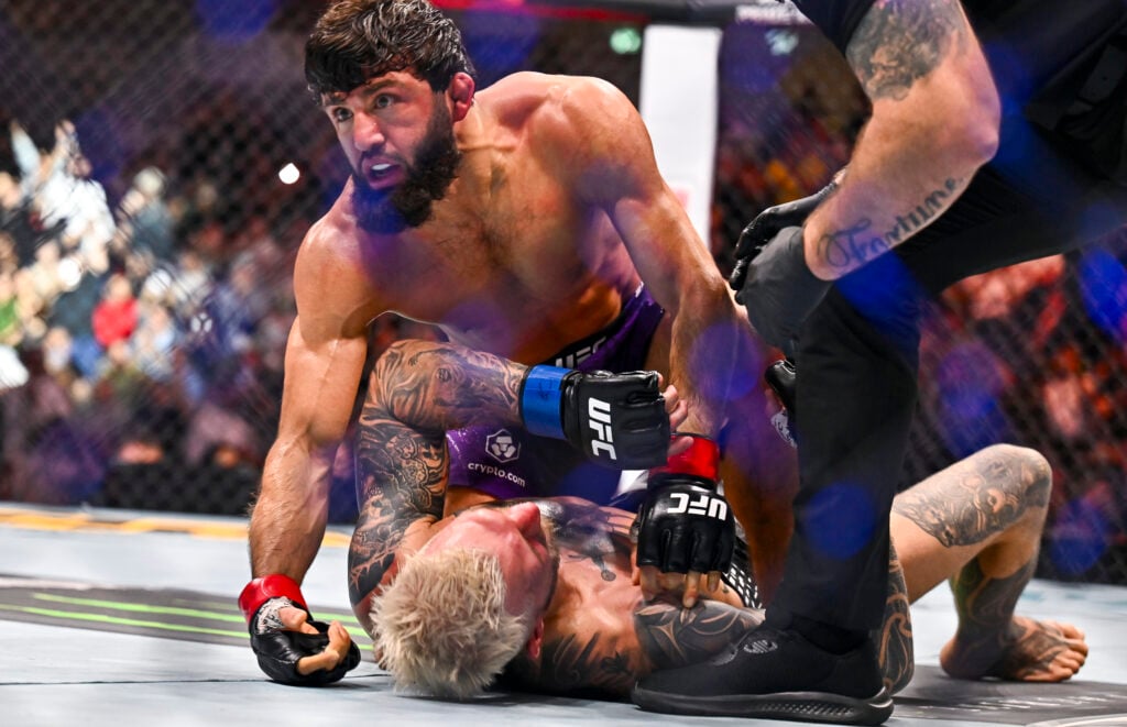 Arman Tsarukyan on top of Dan Hooker during UFC fight