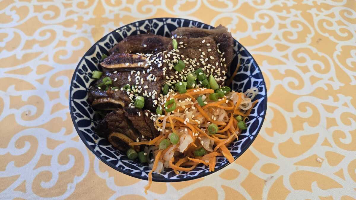 Korean short ribs (galbi) with rice and Vietnamese pickled carrots and daikon radish.