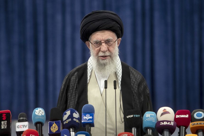 Iran's Supreme Leader Ayatollah Ali Khamenei, addresses the media after casting his vote in presidential runoff elections in Tehran in 2024